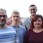Gruppenfoto des queerNB Vorstands: Conni, Nils, Marcel und Bianca (v. l. n. r.)